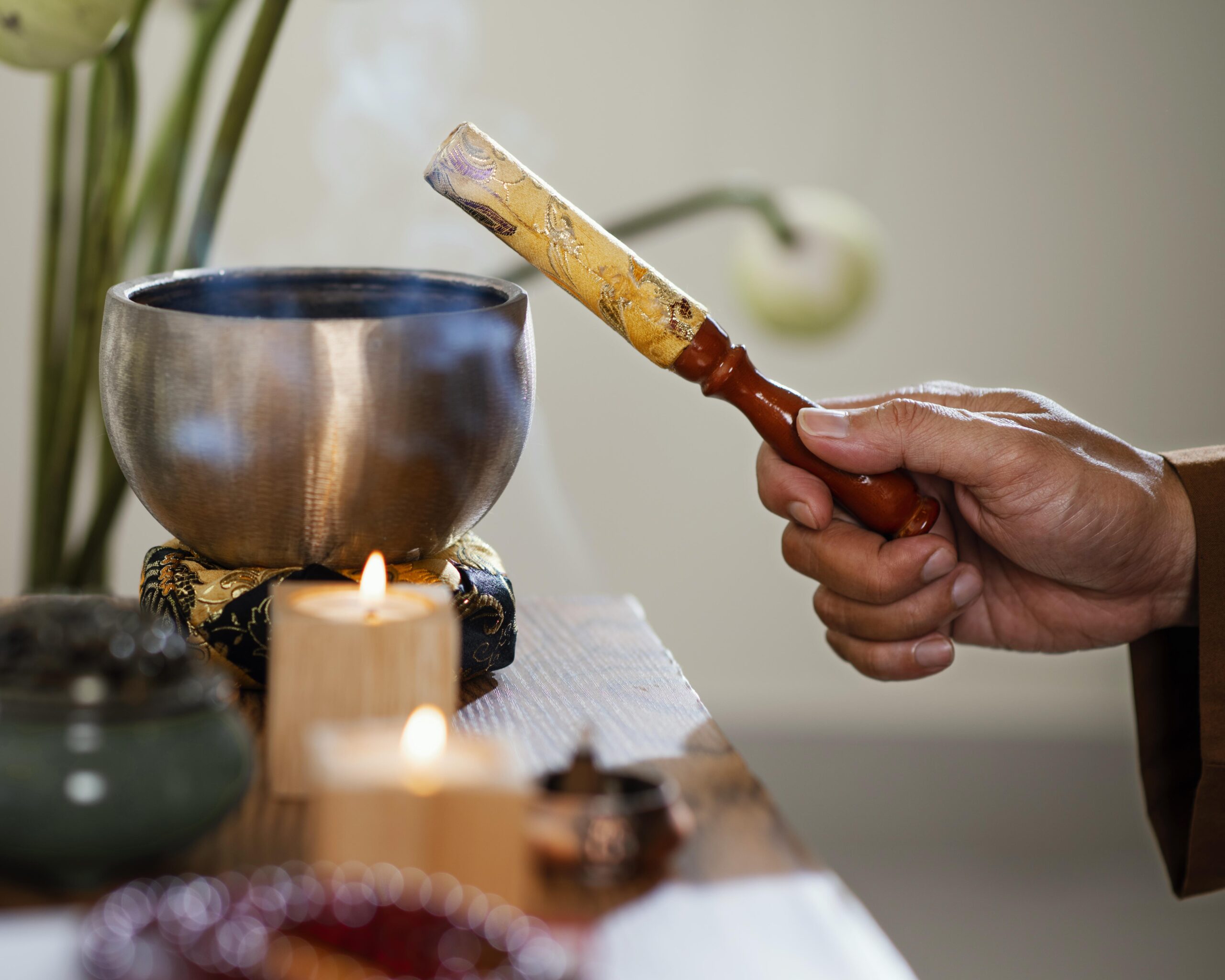 side-view-man-holding-object-prayer-with-candles-bowl
